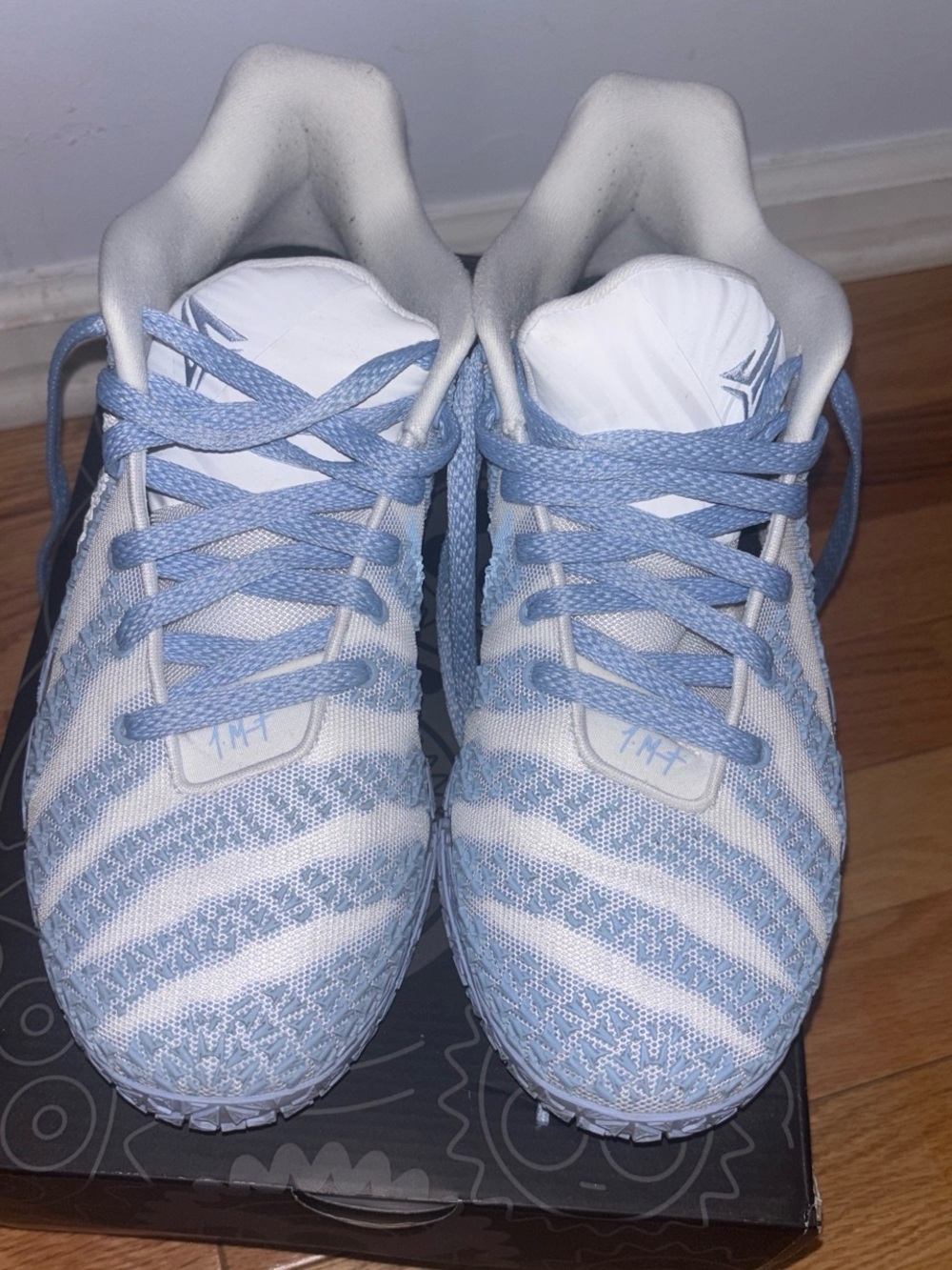 Nike Men’s Athletic Shoes White and Light Blue